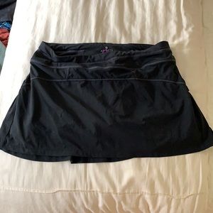 Athleta Black Tennis Skirt with purple spandex